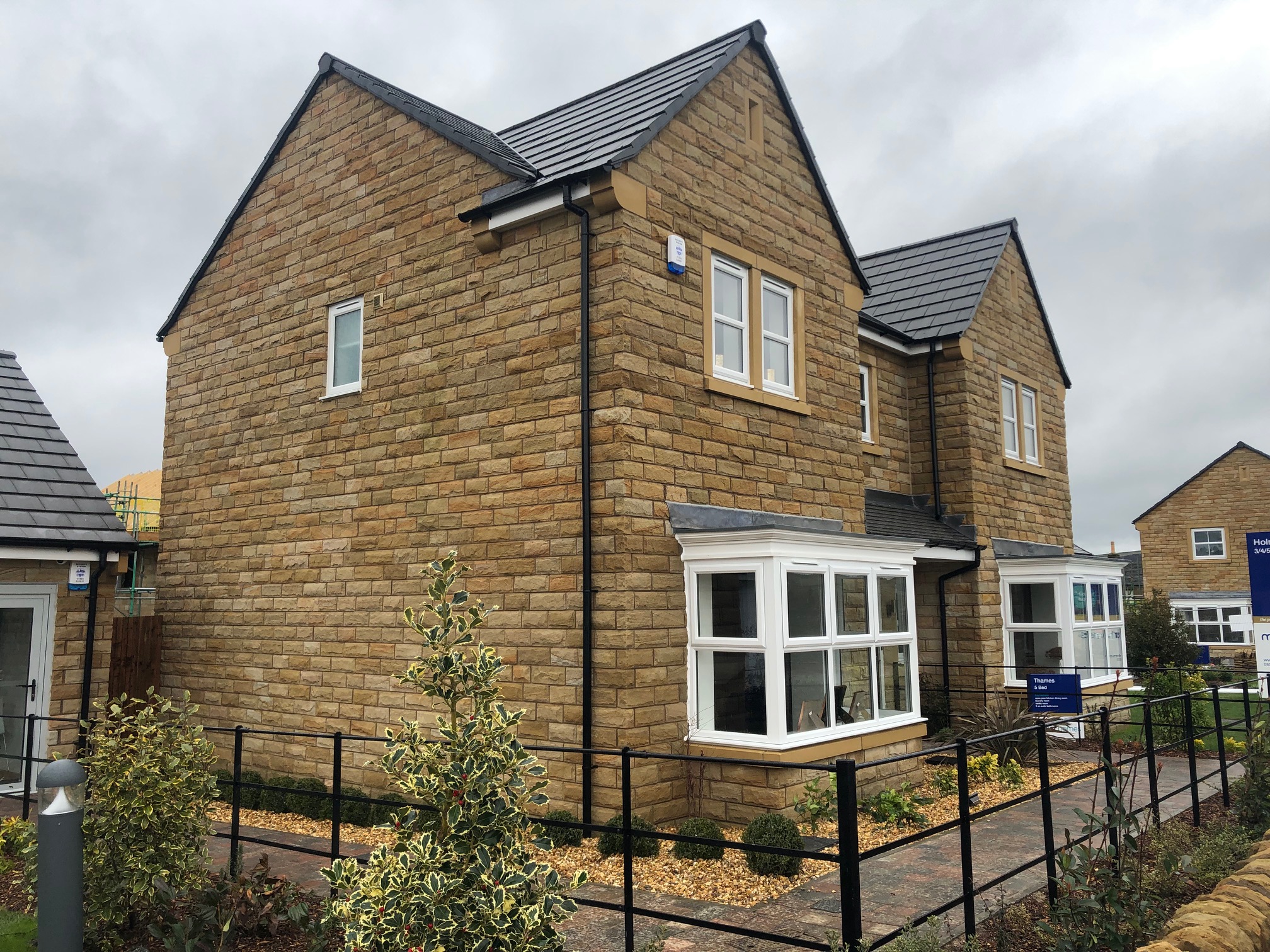 Grey Buff Pitched walling